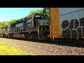 Train engineer working the local puts out fire on tracks on the main line in Logansport, Indiana