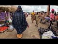 Rural market day in Assahoun village . Cheapest mass food market in Togo west Africa 🌍