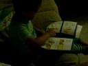 Isaiah reading a book