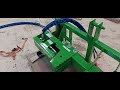 Minnesota Implement Ultra Lite weight tree and post Puller for John Deere compact tractor.