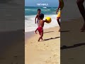 Palestinian boy with amputated limbs plays on Gaza Beach