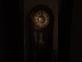 Grandfather clock strikes 12