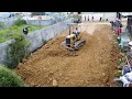 Best fill land! Bulldozer pouring soil delete small forest to build foundation and dump truck unload