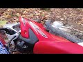 9 year old rocking the single track on a Honda CRF50