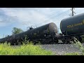 CN 2220 leads CN M337 through Glendale Heights, IL on 7/15/24.