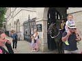 ENTITLED US TOURIST TELLS ANOTHER TOURIST TO GET OUT OF HIS PICTURE at Horse Guards!