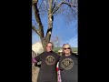 Two girls showing off their Jonnie's Journey t-shirts.