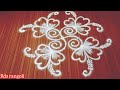 #simple new flower rangoli design with 3-3 dots.....