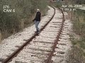 Guy seriously gets hit by a train!