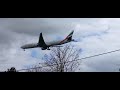 Emirates 777-300er landing at LHR