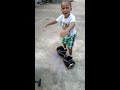 little boy riding a hoverboard