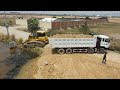 Starting new project Heavy Dozer working push soil Filling/Heavy dump truck unloading soil