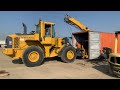 Caterpillar 140K motor Grader Loading inside the 40ft Container and will be ship by the vessel