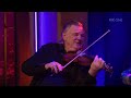 Brendan Gleeson playing the fiddle w/ Hughes Pub musicians on the Late Late Show (Febraury 23, 2024)