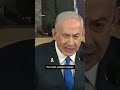 Congresswoman Tlaib holds sign calling Netanyahu ‘War criminal’