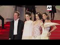 Demi Moore, Dennis Quaid and Margaret Qualley arrive at the Cannes premiere of 'The Substance'