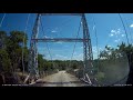Driving over the Regency one-lane suspension bridge
