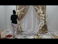 Round floral wedding backdrop with drapes