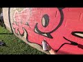 Baby Helps Paint Graffiti Letters on Childrens Park