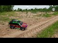 1/10 Scale Rc Crawler Traxxas TRX4 Bronco 4×4 Rc Car Off Road driving through cassava on sandy roads