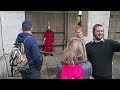 LADY CAPTAIN inspects WINTER CLOAK wearing Life Guard troopers at Horse Guards!