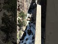 Cliff wall and glacier waterfalls