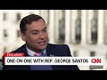 CNN reporter confronts George Santos about his lies