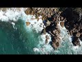 Waves hitting rocks in Bastard Bay, Australia