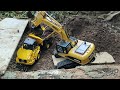 Loading Excavator And Dump Truck