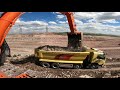 Hıtachı  Excavator Truck loads stony material