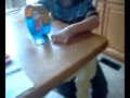 Ayden putting burger king toy together.             } --eric quigley--