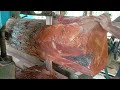 the process of sawing the largest giant mahogany logs into fine truck bed planks