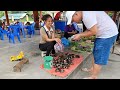 Single mother: harvesting clams to sell - cooking - bathing & applying medicine to her children