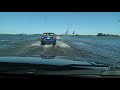 Flooded highway driving in Saskatchewan Canada - 1084457