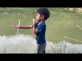 Boy - fishing with traditional fishing net