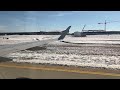 American Eagle E175 snowy landing at Indianapolis Int'l Airport (IND)