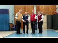 barber shop quartet sings God Bless America at St. Malachy Nationality Festival