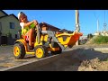 Alex Playing with POWER Wheels Tractors and helps the Big Excavator