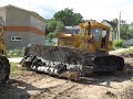 Бульдозер болотник и Драглайн чистят пруд. The bulldozer wading and Dragline clean the pond.