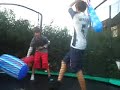 ben and liam inflatable fight on the trampoline!