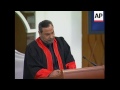 Saddam Hussein in court, turbulent scenes continue