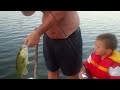 Our grandson catching his first big fish on lake Scugog at 3 yrs old.